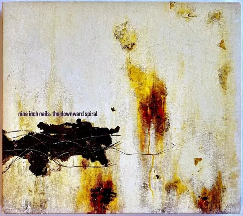 جلد آلبوم The Downward Spiral اثر ناین اینچ نیلز